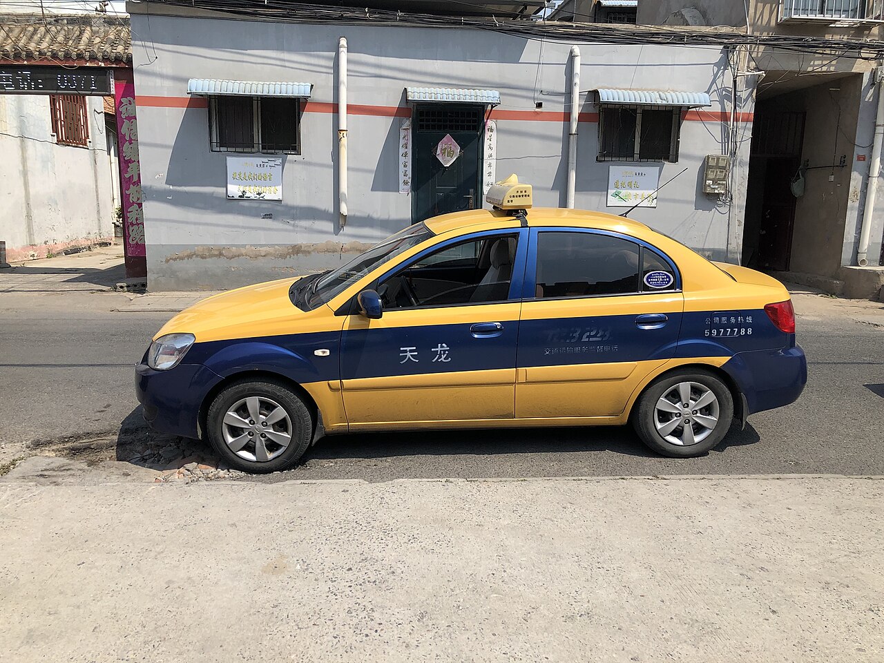 Такси на улице китайского города