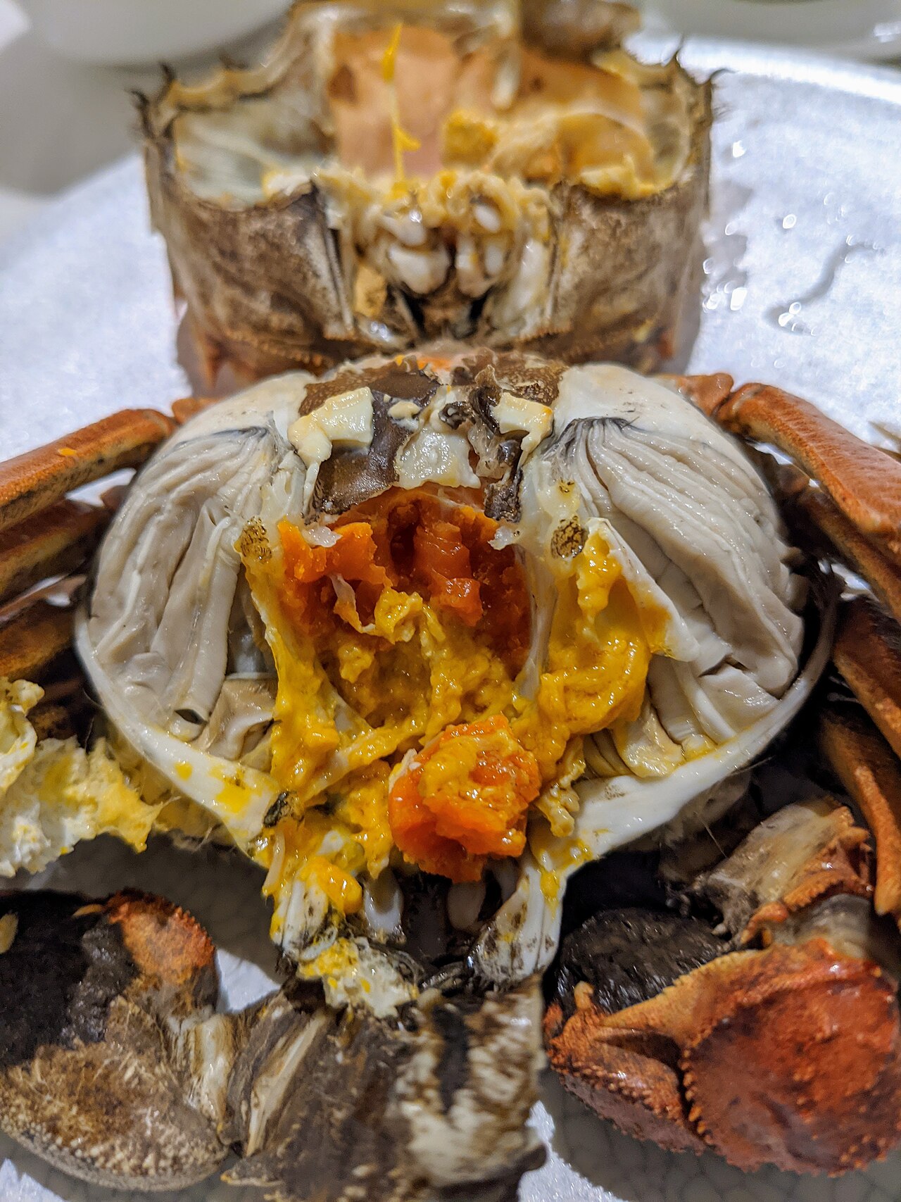 Икра самки мохнаторукогo краба, приготовленного на пару